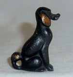 4 Old Painted Cast Iron Miniature Dogs Paperweights or Toys with One Advertising