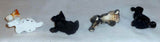 4 Old Painted Cast Iron Miniature Dogs Paperweights or Toys with One Advertising