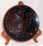 1978 Glazed Redware Large Shallow Plate Brown Rooster On Dark Blue or Black Background By Ned Foltz