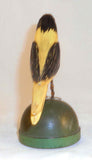 2008 Hand Carved Polychrome Painted Wooden Primitive Folk Art Yellow and Black Colored Bird Wire Legs Green Base By Jonathan Bastian