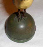 2008 Hand Carved Polychrome Painted Wooden Primitive Folk Art Yellow and Black Colored Bird Wire Legs Green Base By Jonathan Bastian