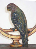 Antique Bradley and Hubbard Painted Cast Iron Doorstop Parrot/Parakeet in Ring