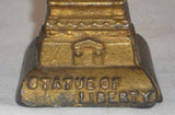 Antique A.C. Williams Cast Iron Gold Colored Statue of Liberty Still Penny Bank