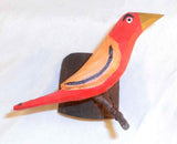 2008 Hand Carved Polychrome Painted Hanging Wooden Primitive Red Bird Perched on Branch By Daniel and Donna Strawser