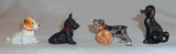 4 Old Painted Cast Iron Miniature Dogs Paperweights or Toys with One Advertising