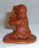 2007 Breininger Redware Miniature Figurine Dog Sitting on Behind Basket in Mouth