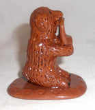 2007 Breininger Redware Miniature Figurine Dog Sitting on Behind Basket in Mouth