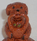2007 Breininger Redware Miniature Figurine Dog Sitting on Behind Basket in Mouth