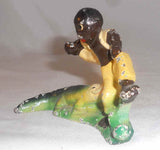 Old Painted Cast Iron Bottle Opener Alligator Chasing Boy Nipping at His Pants