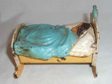 Vintage Iron & Tin Polychrome Painted Penny Bank Baby in Cradle with Bird