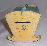 Vintage Iron & Tin Polychrome Painted Penny Bank Baby in Cradle with Bird