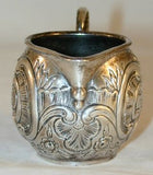 1760s French Silver Miniature Creamer Repousse Floral Design