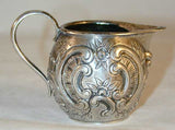1760s French Silver Miniature Creamer Repousse Floral Design