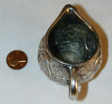 1760s French Silver Miniature Creamer Repousse Floral Design