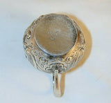 1760s French Silver Miniature Creamer Repousse Floral Design