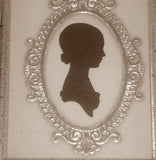 Pair Antique Silhouette of Women within Golden Ovals Matching Gold Leafed Frames