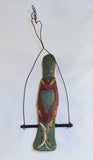 1992 Carved and Painted Wood Folk Art Parrot on Swing Hearts Decoration By Jonathan Bastian