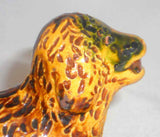1989 Glazed Redware Figurine Dog Laying Down Stick in Mouth Breininger Pottery