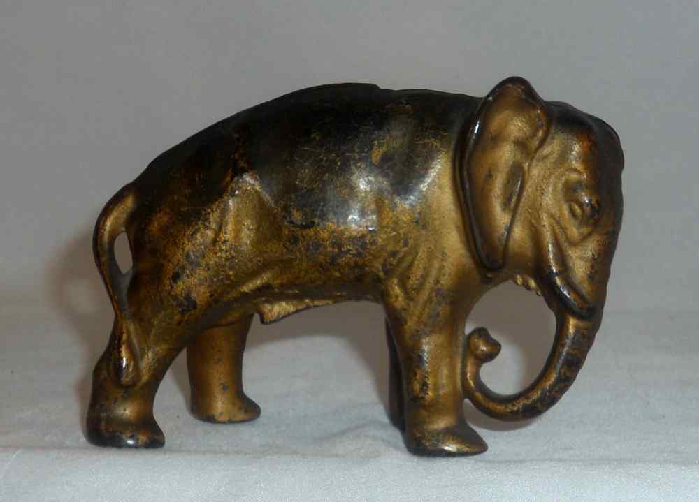 Antique Cast Iron Still Penny Bank Elephant with Tucked Trunk by Arcad