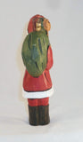 Contemporary Hand Carved Wood Polychrome Painted Santa with Toy Bag Figure By Earl Houck