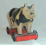 1989 Hand Carved Painted Wood Primitive Folk Art Pig Pull Toy Wheels Signed S.B.